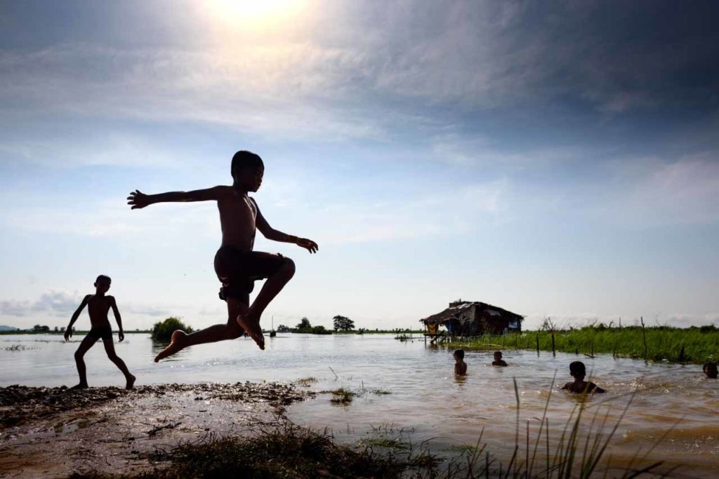 Khmer kids playing near Tonle Sap Lake