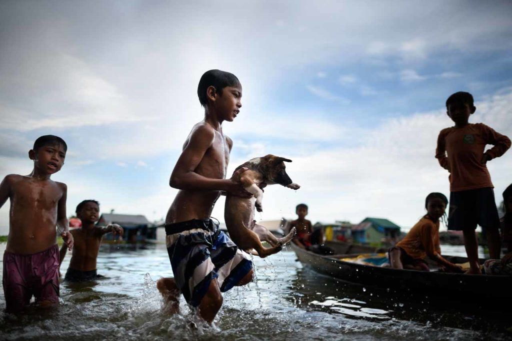 Kids playing in the Tonle Sap Lake