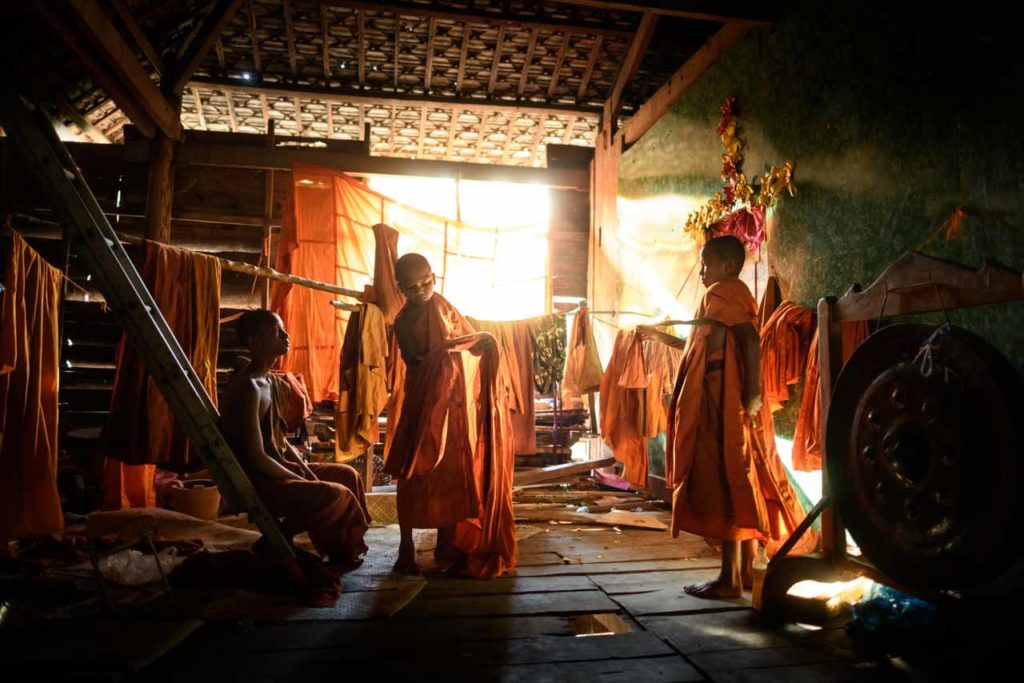 Monks getting dressed in Cambodia