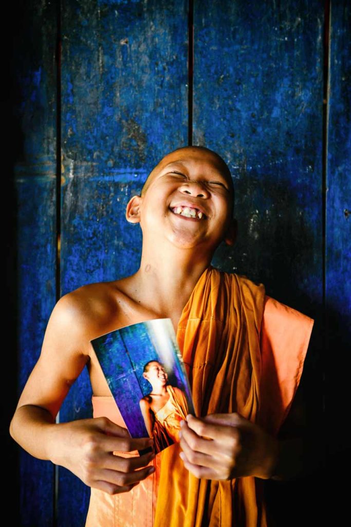 Monk laughing