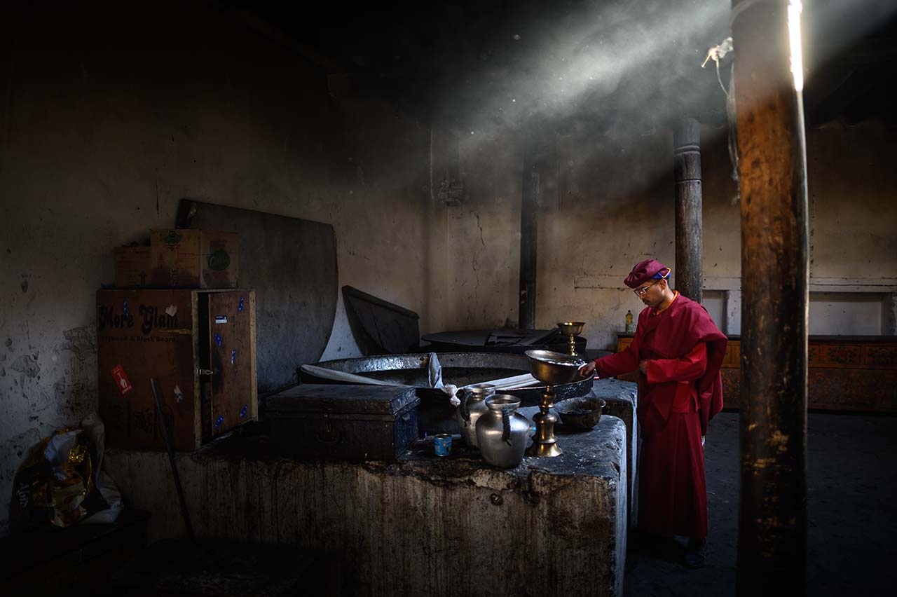 Ladakh festival, monk in the kitchen